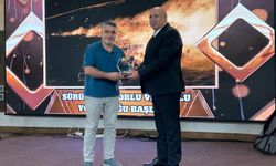Gazeteci Özkan Olcay, birincilik ödülünü aldı