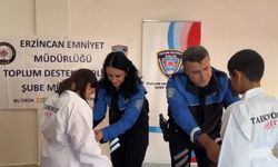 Emniyet ekiplerinden minik sporculara kıyafet desteği
