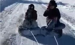 Lastikten kızak yaptılar: Çocukların kar macerası kameralara yansıdı