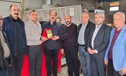 Fazla yardımı kabul etmeyen esnafa örnek davranış plaketi verildi