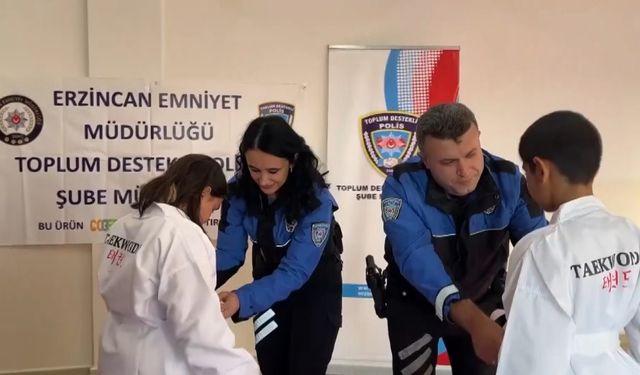 Emniyet ekiplerinden minik sporculara kıyafet desteği