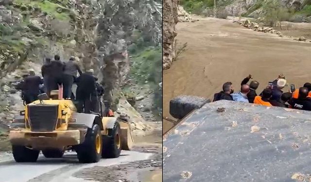 Dere taştı, işçiler kepçeyle taşındı